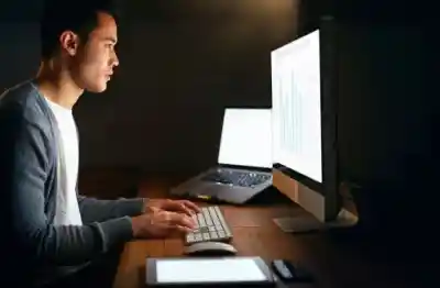 IT Administrator Checking Server Logs On A Monitor Esm W400